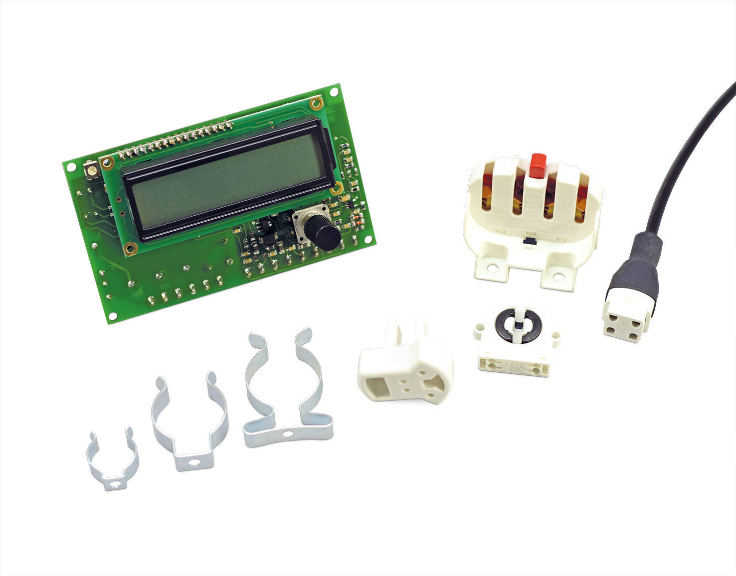 UV system accessories including spring steel clamps, holding brackets, lamp holders, plug-on sockets, UV display monitors, connection cables and other components.